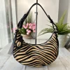 Borsa Molly Vera Pelle Mezzaluna a Spalla in Cavallino Zebra